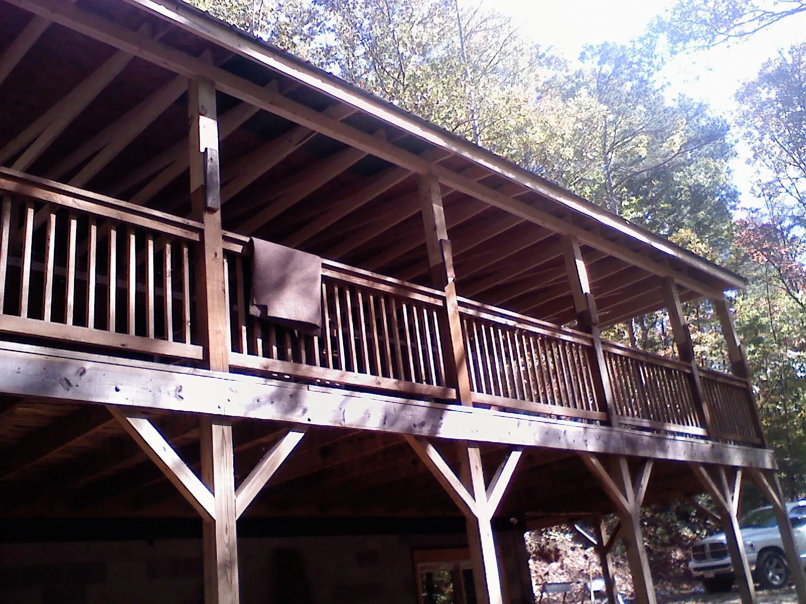 Timber framing under a new elevated porch and deck — Roof Leak Repair in Bellefontaine by Roofing Brothers